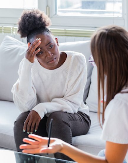 Patient receiving bad news, She is desperate and crying, Doctor support and comforting her patient with sympathy. Don't worry, this medical test is not so bad